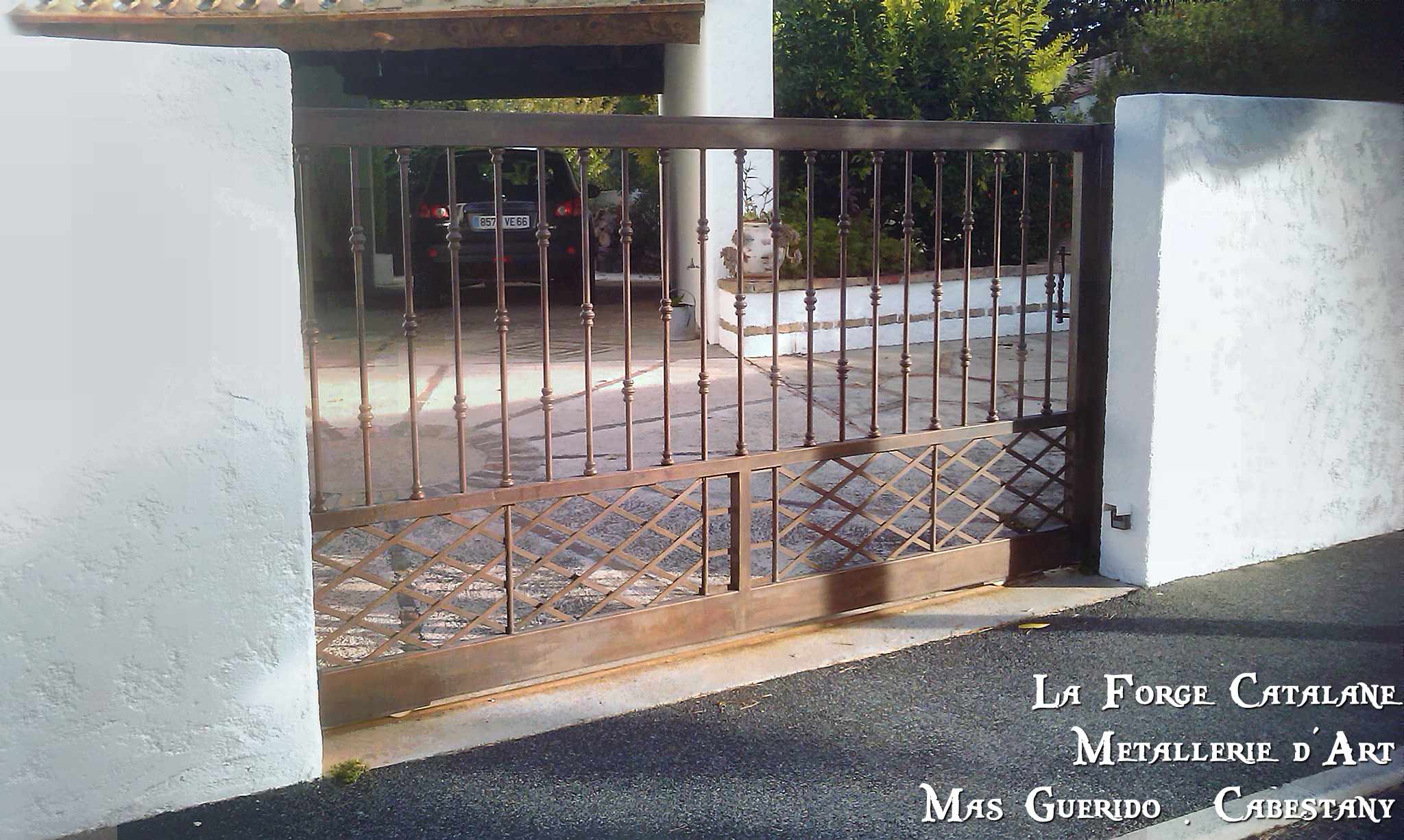 portail barreaudage vertical rond avec bagues  forge catalane.jpg